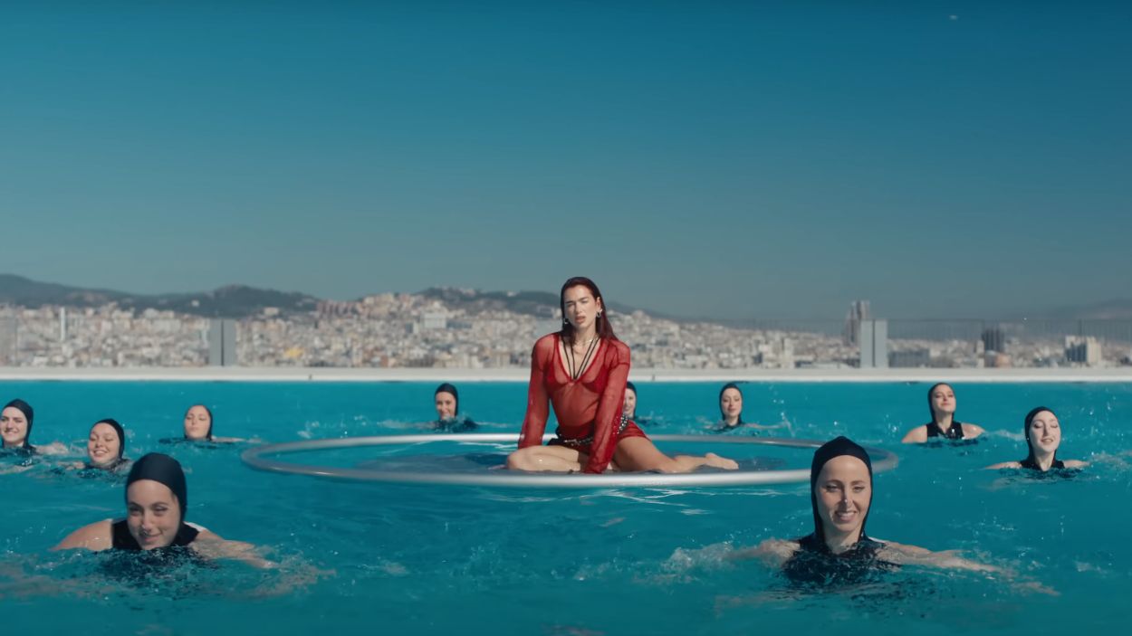 What is a woman from Sant Cugat doing in Dua Lipa's new music video?