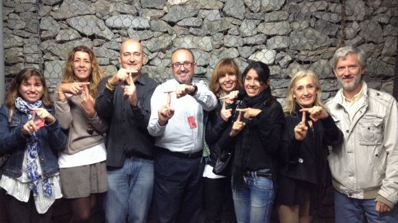 L'equip de Toni Molina (ell en el centre de la imatge) fent la 'T' que simbolitza el candidat